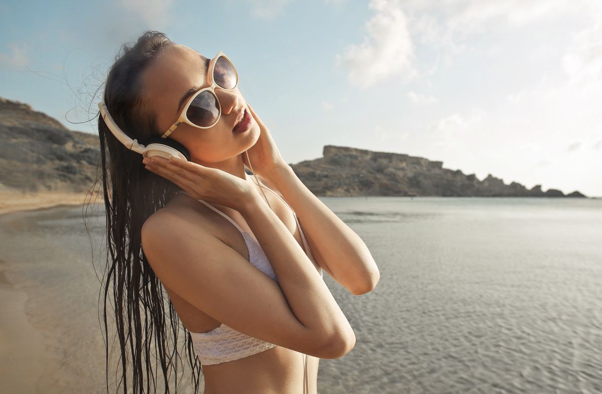 A woman relaxing carefree on the beach